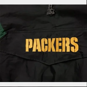 HOMAGE-x-Starter-Packers-Blackout-Breakaway-Pullover-Jacket.